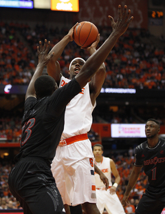 Syracuse small forward C.J. Fair takes a jump shot in the second half.