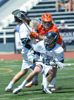 Villanova midfielder Eric Gartner carries the ball, and looks to escape a defender.