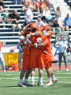 Syracuse celebrates after a goal.