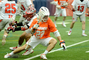 JoJo Marasco keyed Syracuse's seven-goal fourth quarter comeback as the Orange beat Rutgers 12-11 on Senior Day. Marasco commanded the offense with five assists and a goal Saturday.