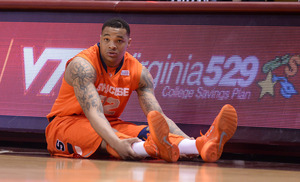 DaJuan Coleman prepares to  check in during Syracuse's 72-52 win against Virginia Tech on Tuesday. Coleman did not play in SU's last two games before subbing in with 3:27 left against the Hokies.