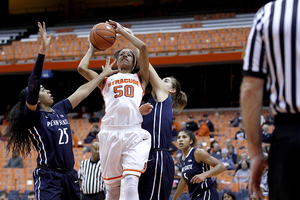 Syracuse forward Briana Day, in 22.6 minutes per game, is averaging 11.4 rebounds to go along with 11.7 points.