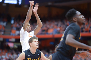 Syracuse forward Chris McCullough holds his follow-through after he released a shot during the first half of SU's win over Long Beach State.