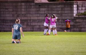 Syracuse celebrates one of its goals on Thursday night against Miami. The Orange pulled out the win in overtime after being held scoreless for the first 84 minutes.