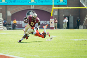 Florida State's Jacques Patrick (No. 9) used his big physique to break tackles against Syracuse on Saturday en route to 162 rushing yards.