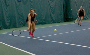 Maria Tritou's height has helped her reach difficult shots on the court and drill better serves this season. She is 6-2 in singles matches. 