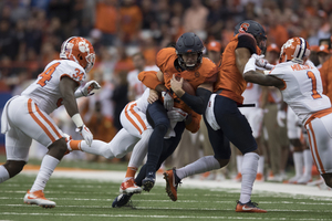 Eric Dungey, pictured above on Oct. 13, broke the SU program record for QB rushing touchdowns, passing Donovan McNabb.