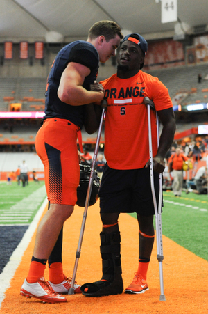 Antwan Cordy, right, used crutches on Sept. 1 when he returned to the field after exiting in the first quarter of the first game of the season with an injury to his right leg.