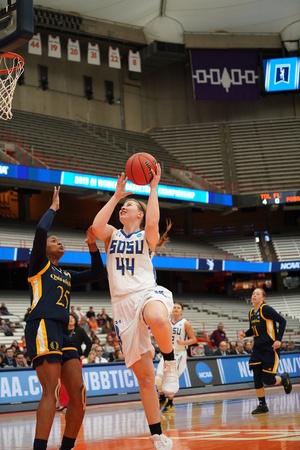 Myah Selland, pictured against Quinnipiac on Saturday, driving toward the rim. 