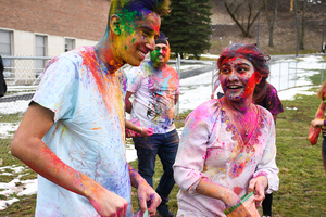 SU students, Ballu Balakrishnan (left) and Khadija Isfahan, celebrate the festival of colors.