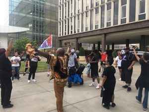 When the group arrived at the Syracuse Police Department’s headquarters, they chanted “Say his name,” followed by “George Floyd.”