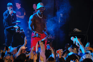 Rapper, DaBaby, watches the crowd sing the lyrics to his songs during his performance in Westcott Theater. Hundreds of Syracuse University students and Syracuse residents crowded the theater, sang and moshed with DaBaby. 