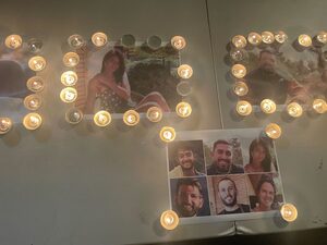 Attendees place candles around photos of the six deceased Israeli hostages — Ori Danino, Carmel Gat, Hersh Goldberg-Polin, Alexander Lobanov, Almog Sarusi and Eden Yerushalmi. Several Jewish and Israeli groups organized the vigil shortly after the news of their deaths became public.
 