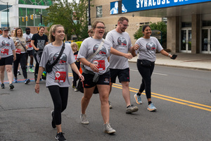 Those who choose to walk begin the Run the Redline race. Participants were able stop and view information about redlining along the route.