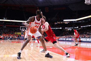 Jyáre Davis and Eddie Lampkin Jr. combined for 29 points to lead Syracuse past NC State 74-60 on Wednesday. 