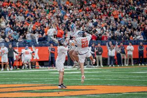 No. 11 Syracuse scored three unanswered goals in the final minutes against No. 7 Johns Hopkins en route to a 13-10 victory.