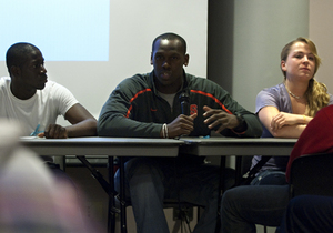 Amadou Gueye, Chandler Jones and Lucy Schoedel, a freshman track member, a junior football player and a senior womens hockey player, respectively, discuss sexual assault on campus during a panel with six other Syracuse University student athletes Monday night at Goldstein Student Center.