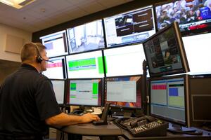 Pete Cifaratta, a communications specialist at DPS, works on one of the dispatch centers in the new communications center in Sims Hall. Up to ten different dispatch stations can be set up at once.