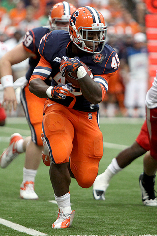 Running back Jerome Smith takes a carry.