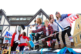 Kappa Alpha Theta sorority sisters dance with brooms as they welcome new members to their sisterhood. 