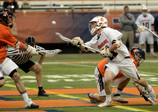 Cal Paduda gains the advantage on a faceoff. He replaced Chris Daddio as the starter.