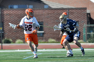 Jojo Marasco holds the ball looking to pass. The senior finished with four assists to give him 34 for the season, tying Paul Gait's 1990 total for the most by an SU midfielder.