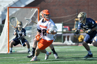 Jojo Marasco draws the attention of two Fighting Irish defenders.