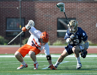 Henry Schoonmaker catches his balance with a Notre Dame player bearing down on him.