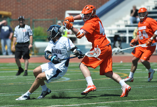 Syracuse defender Matt Harris defends Villanova attack Jack Rice.