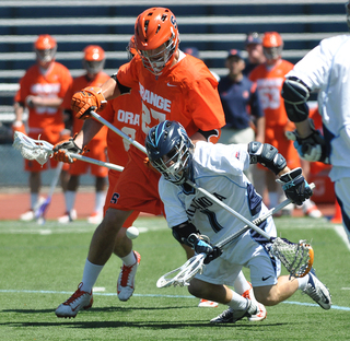 Syracuse's Sean Young defends Villanova midfielder John Kluh.