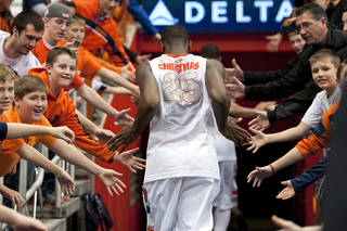 Fans congratulate Rakeem Christmas as he walks down the tunnel and toward the locker room.