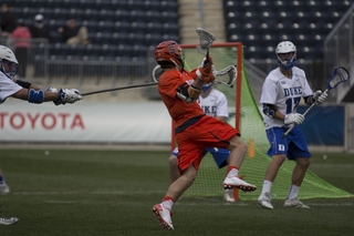 Kevin Rice rips a shot at the Duke goalie. Rice finished with three goals.