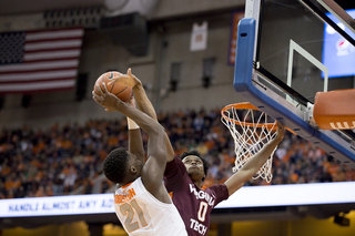 Tyler Roberson gets blocked on his way up. He dominated the glass with 11 rebounds, but only scored six points. 