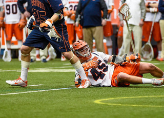 Randy Staats tries to get up after taking a spill on the turf.