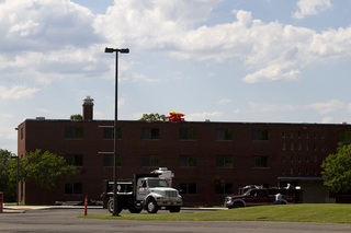 Construction crews are coating the roofs and upgrading the flooring at the Skyhall residence halls on South Campus. Photo taken July 5, 2017