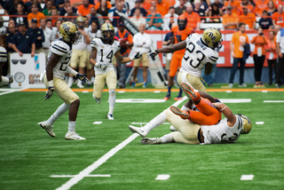 Pittsburgh wraps up a Syracuse player.