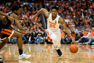 Battle looks to drive left on DeAndre Hunter. 