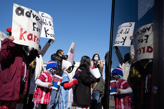 Community members gathered before the march in Clinton Square.